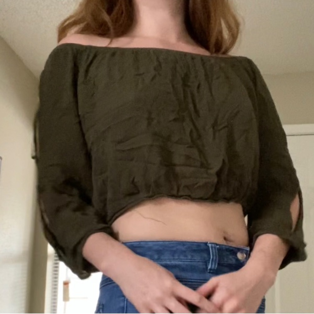 Light and airy crop top. Off shoulder with loose, long sleeves.